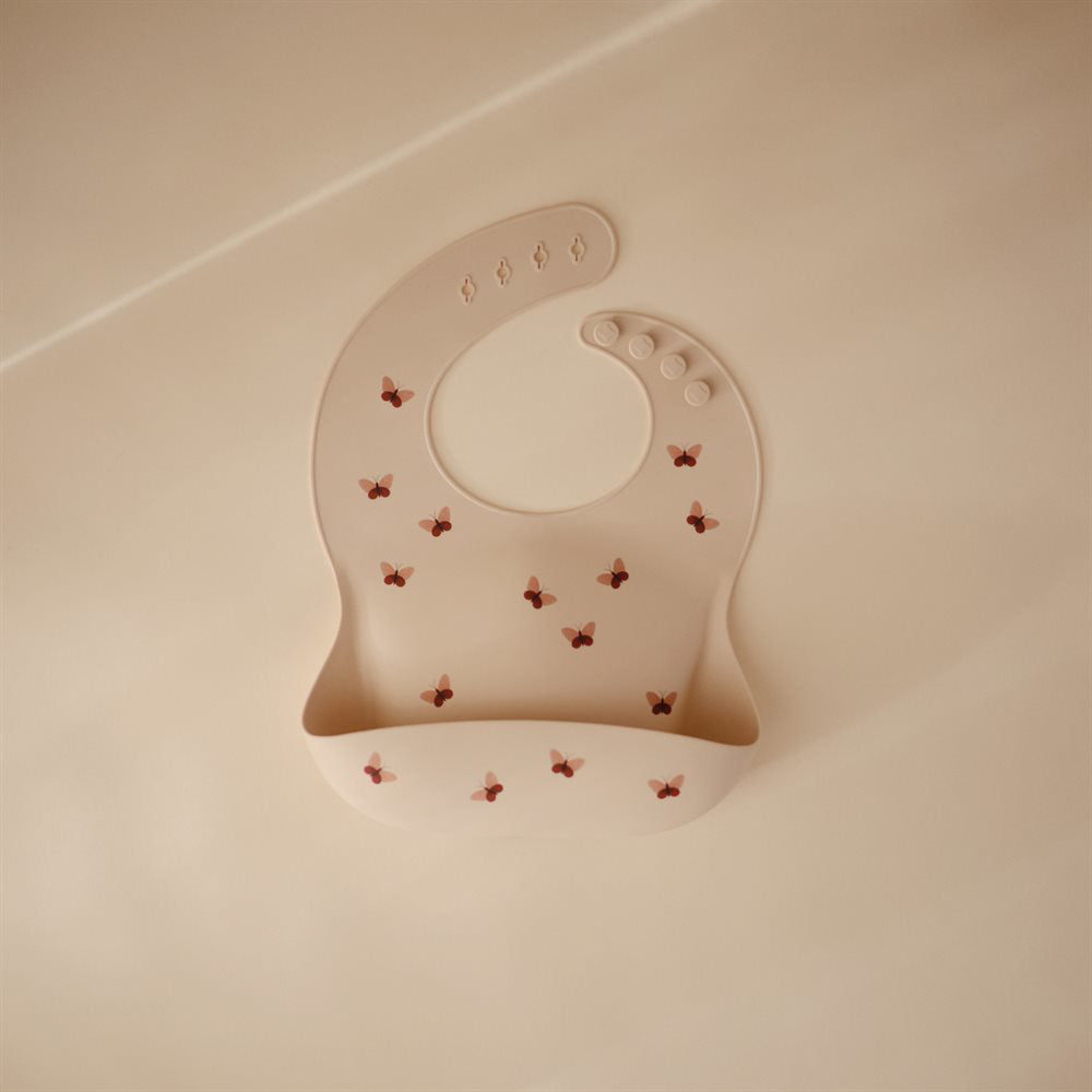 Mushie® Silikonski slinček Butterflies Mushie