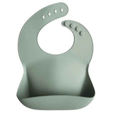 Mushie® Bavaglino in silicone Cambridge Blue