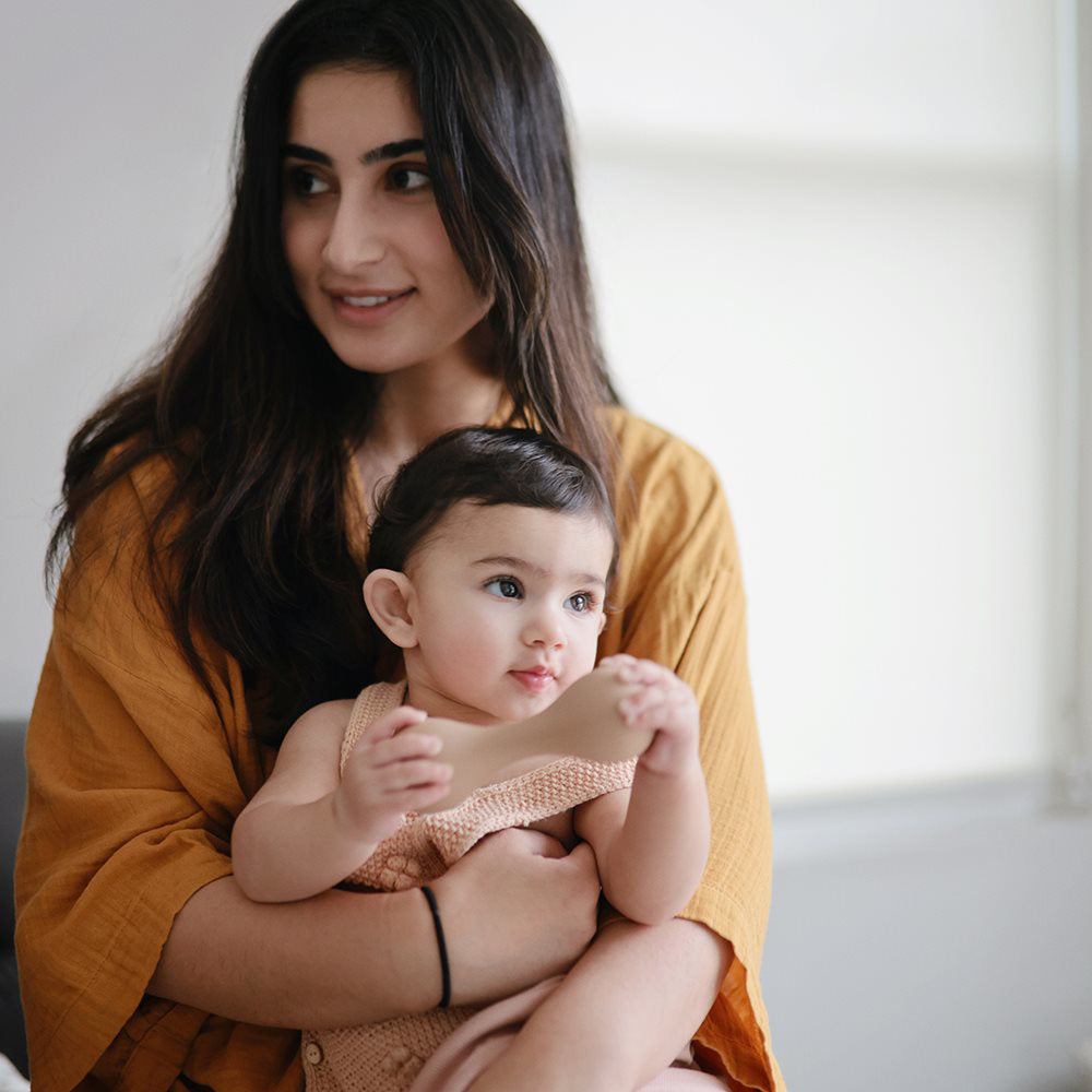 Mushie® Silikonska ropotuljica Blush Mushie