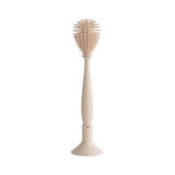 Mushie® Spazzola per biberon Shifting Sand