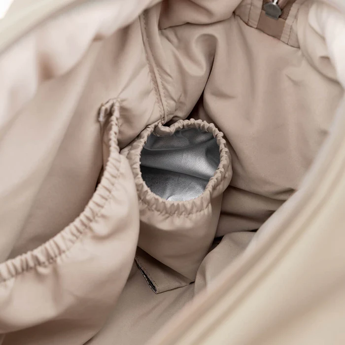 Done by Deer® Previjalna torba Quilted Sand Done by Deer