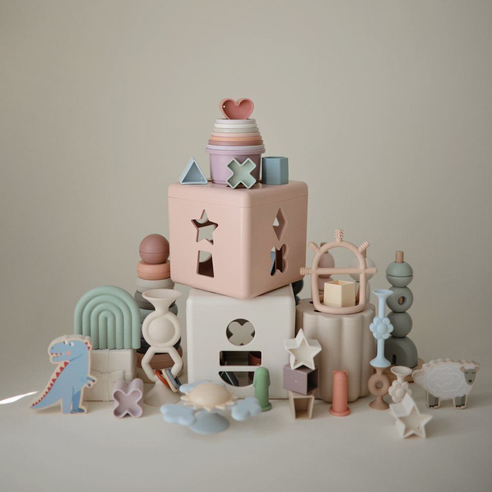 Mushie® Kocka za razvrščanje oblik Petal Mushie