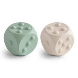 Mushie® Dice Press Toy 2-pack Cambridge Blue/Shifting Sands