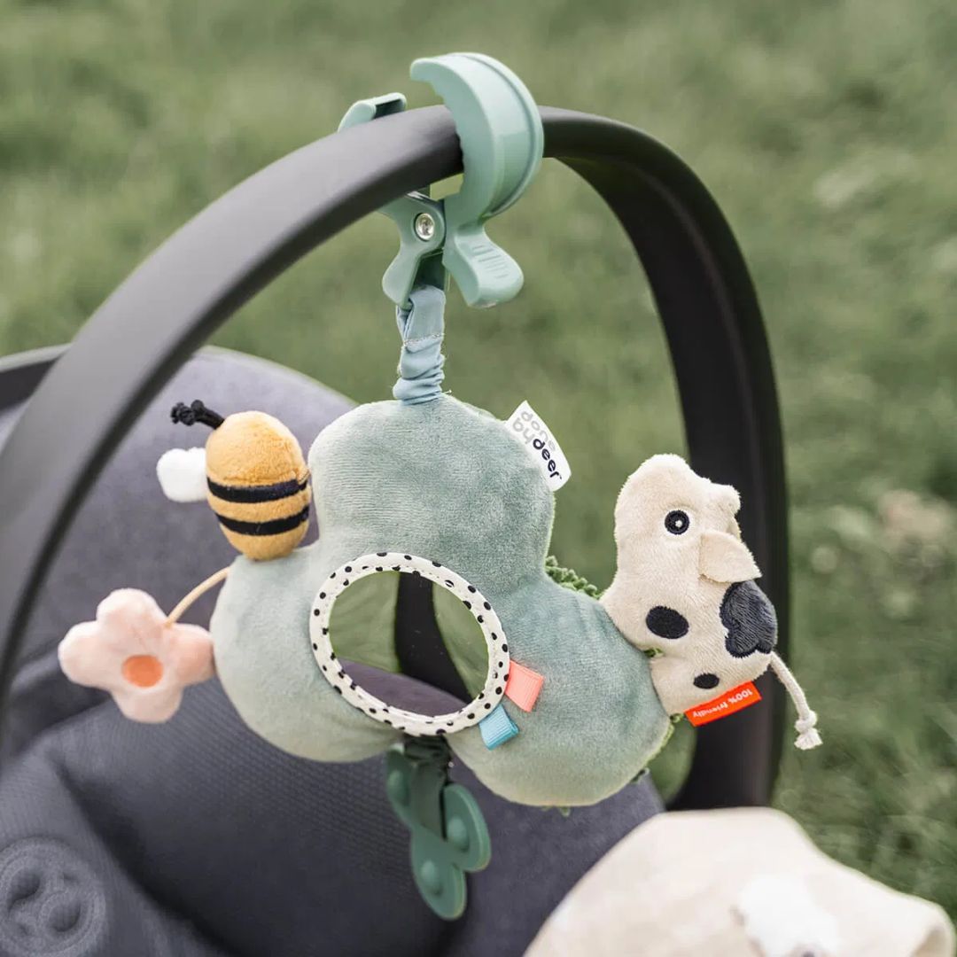 Done by Deer® Senzorična igračka za na pot Tiny farm Green Done by Deer