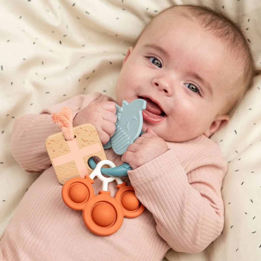 Done by Deer® Senzorični aktivnostni obroč Celebration Colour mix Done by Deer