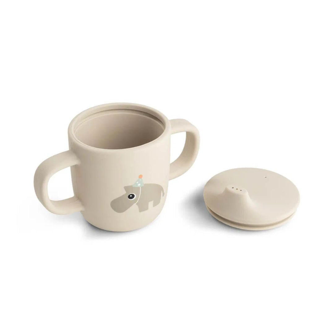 Done by Deer® Silikonski lonček s pokrovčkom in ročaji Celebration Sand Done by Deer