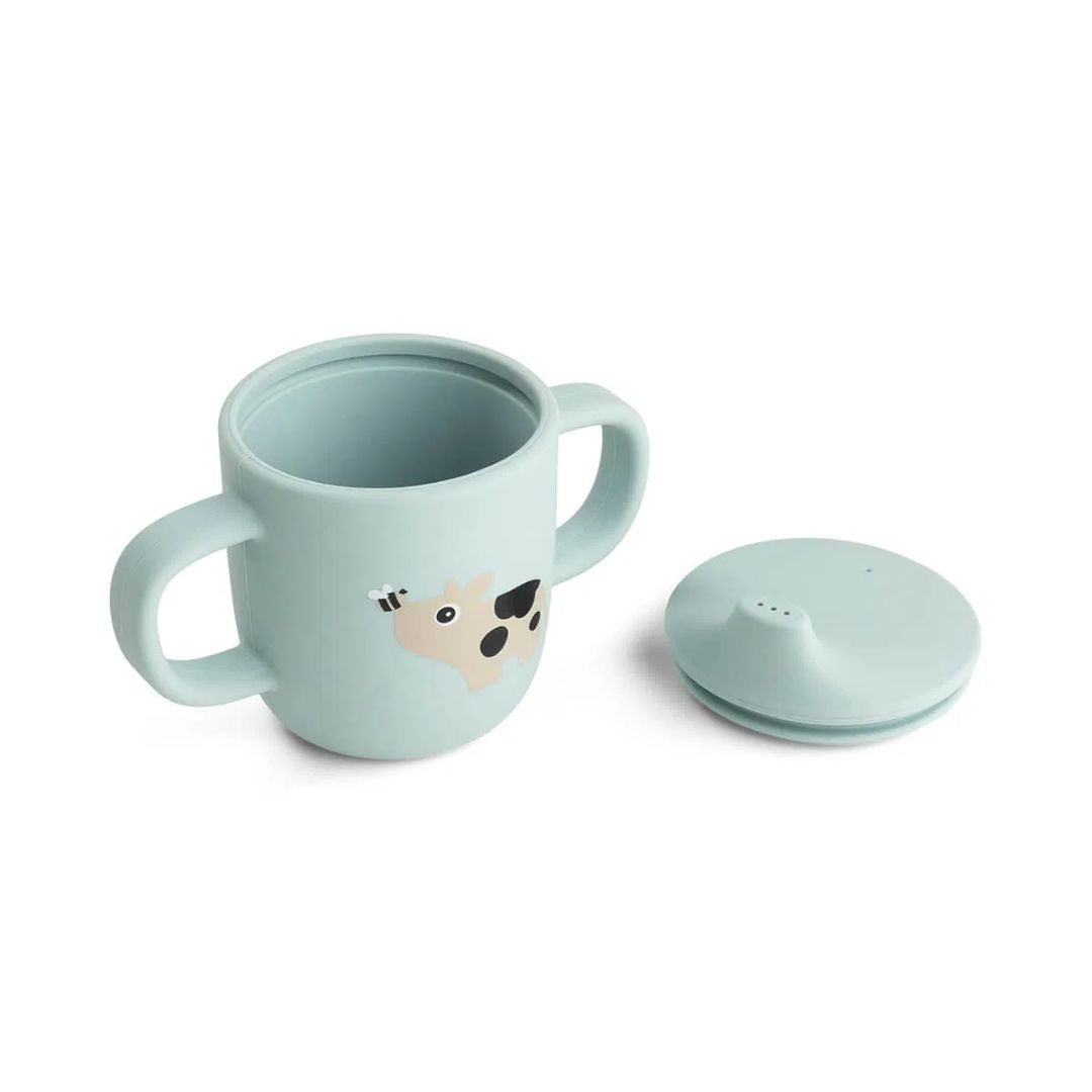 Done by Deer® Silikonski lonček s pokrovčkom in ročaji Tiny Farm Blue Done by Deer