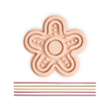 Mushie® Giocattolo attivo in silicone Petal Blush